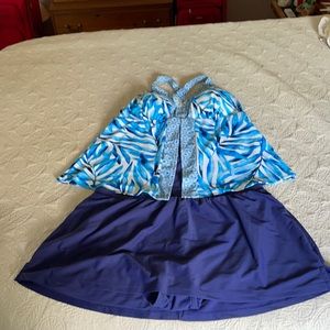 Skirted tankini with flyaway front top.